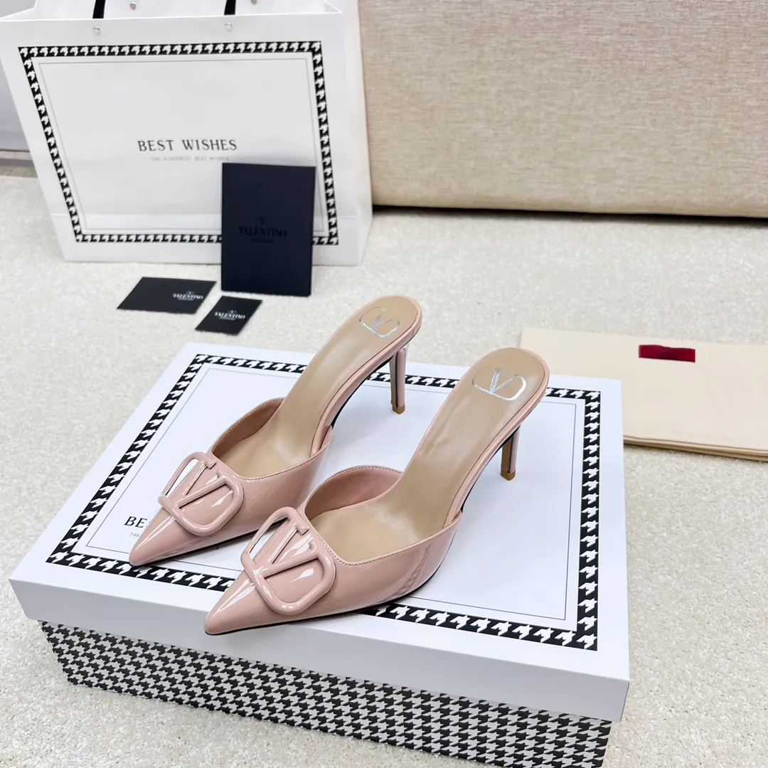 💕💕Factory direct selling price p500💕💕 VALENTINO latest V Logo buckle back empty slippers🔥🔥🔥 🕳️🕳️🕳️ Exclusive original 1-1 development, no goods without the original 〰 ɪɴлᴏʀᴍᴀᴛɪᴏɴ 〰 Buckle: V-LoGo leather buckle Material: imported patent leather Lining: full-grain sheepskin Outsole: Italian dyed cowhide Midsole: Italian original craft material Process: computer stitching, machine shaping Heel height: 4.0/8cm Made in Italy 🇮🇹 Ready stock code: 35 36 37 38 39 Ready stock Customized code: 34 40 41 Shipping time is 1-3 days, non-refundable